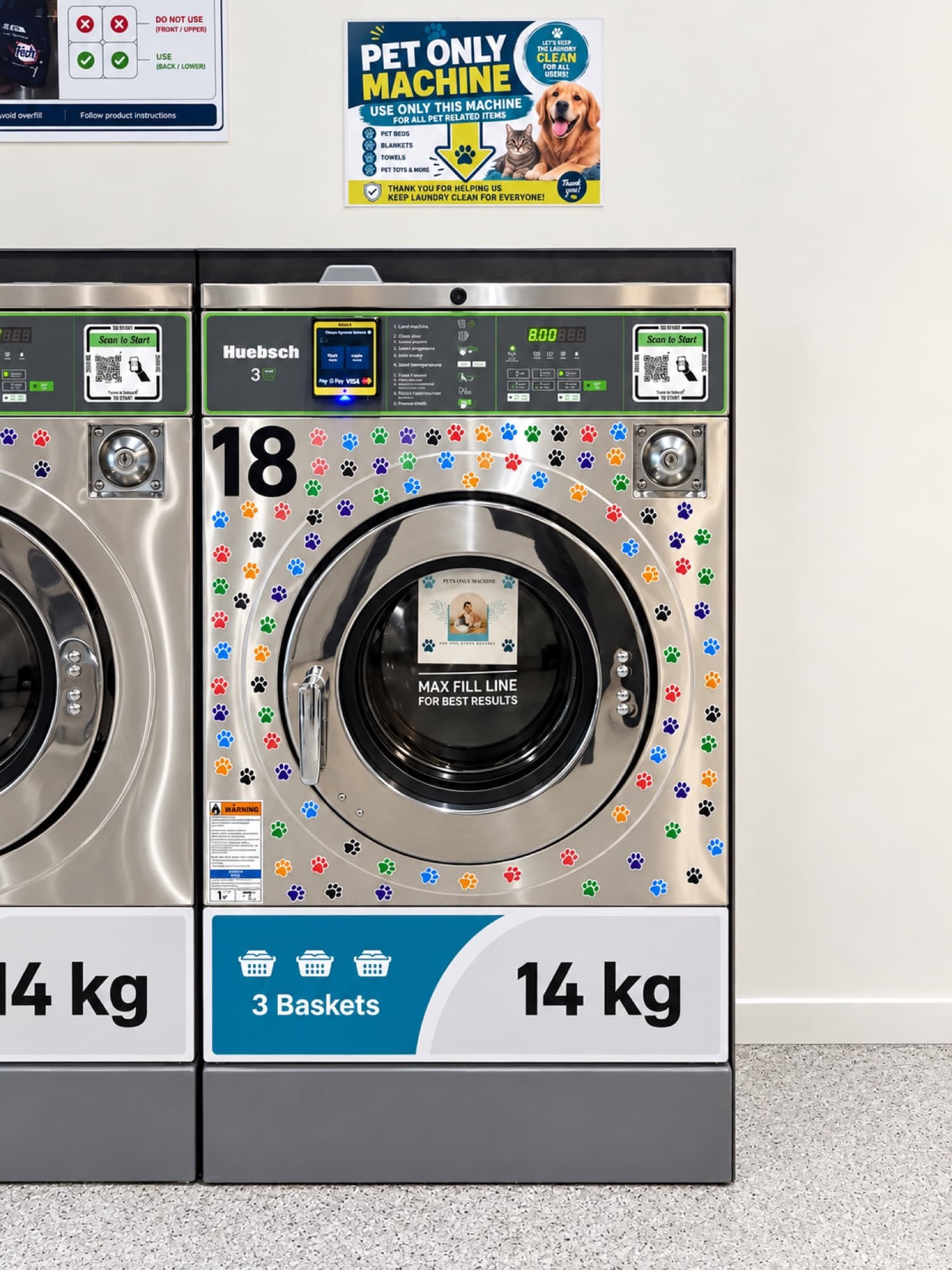 Close-up of a Spakleen pet only washing machine ringed with paw-print decals, below the Pet Only Machine notice